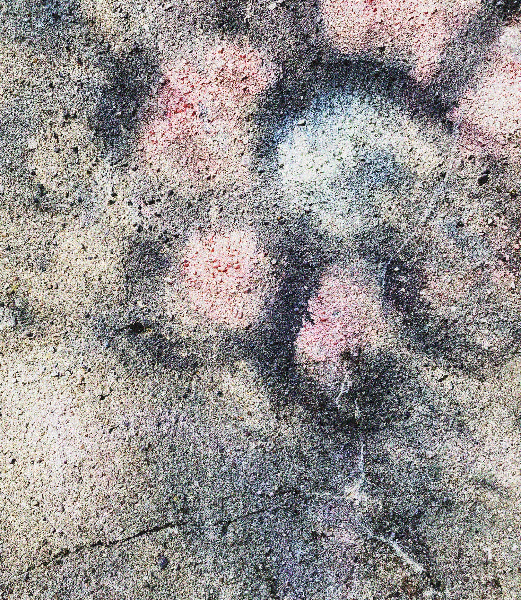A weathered painted-concrete surface — the textured ground of Markfield Community Garden.