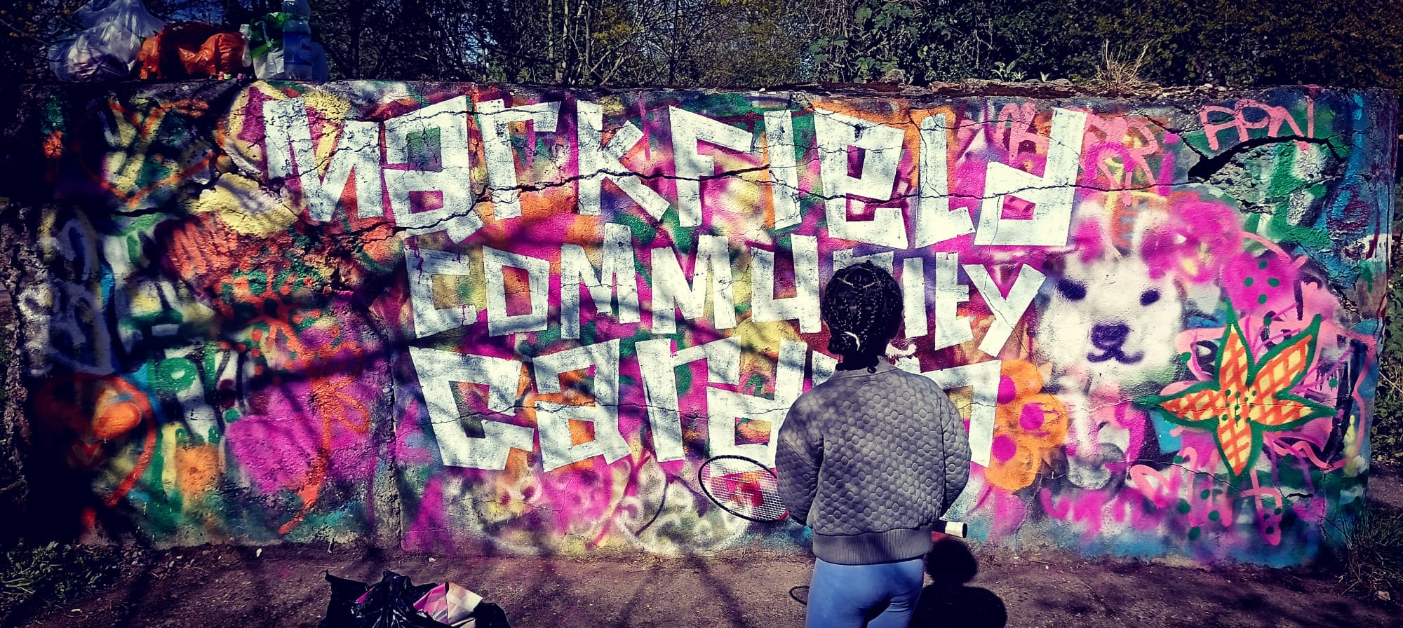 The finished Roots and Rebels wall at Markfield Community Garden.
